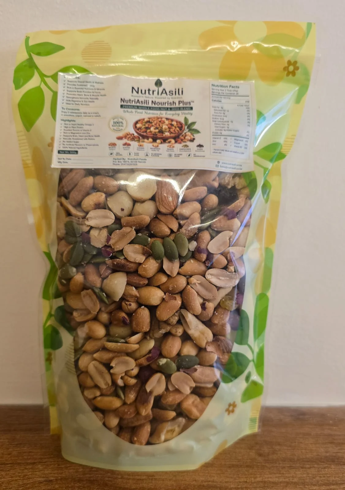 Assorted premium nuts and seeds including almonds, cashews, macadamia, walnuts, and pumpkin seeds